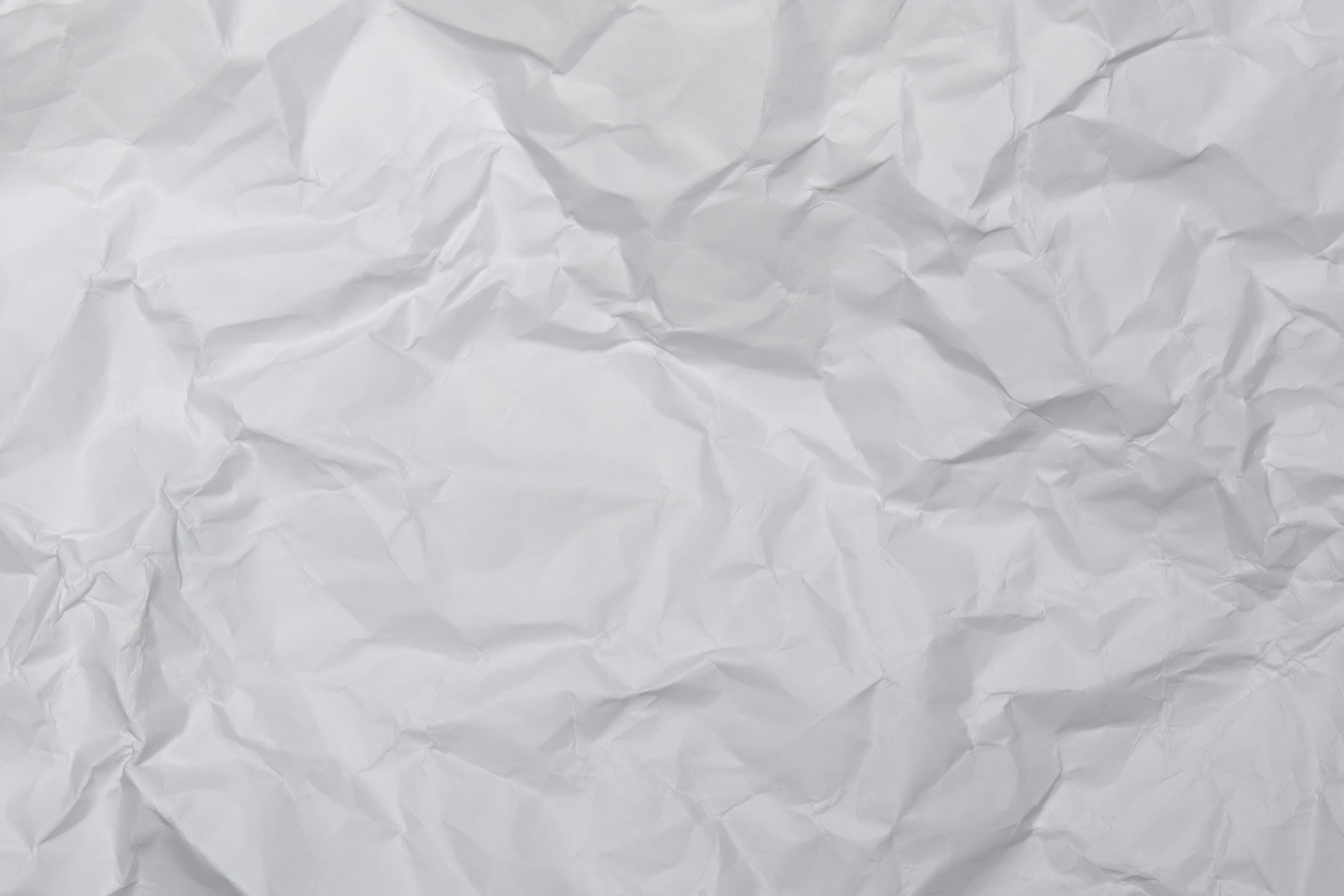 White Crumpled Paper Texture Background. White Wrinkled Paper Te